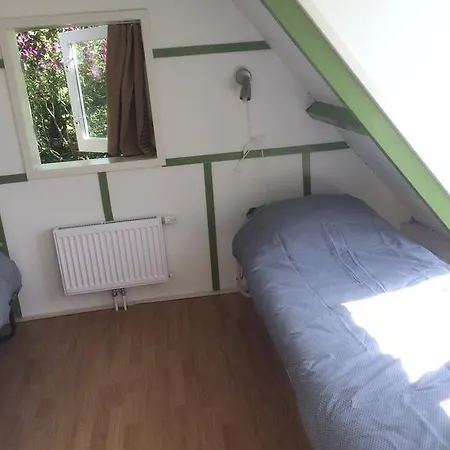 לינה וארוחת בוקר Het Witte Huis *